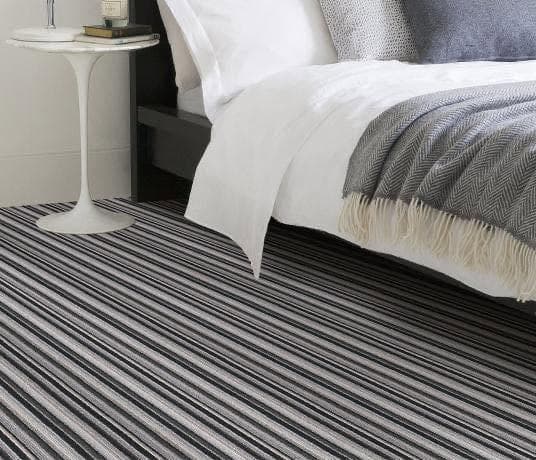 Beautifully fitted carpet in a calm, neutral bedroom setting